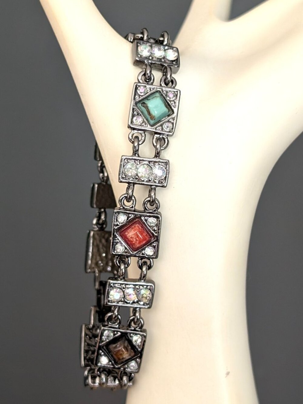 Gray metal bracelet with AB crystals and stones